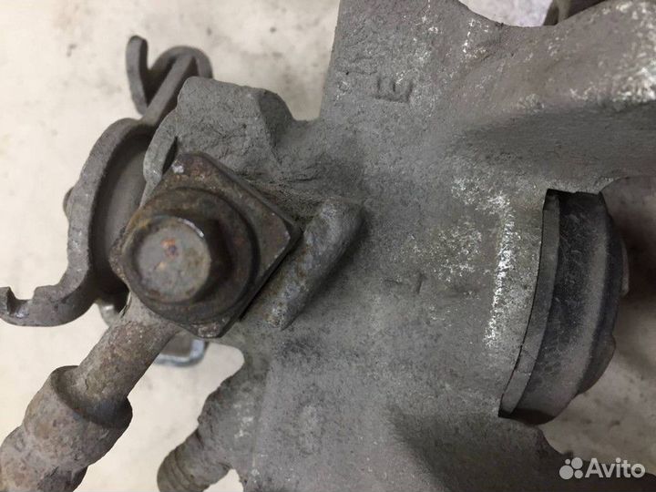 Суппорт задний левый Opel Astra