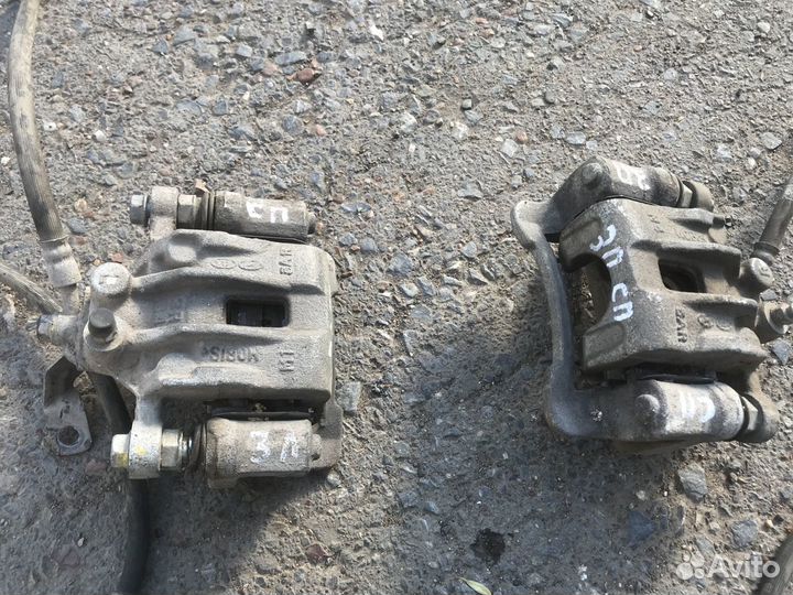 Суппорт передний задний киа спортейдж 3