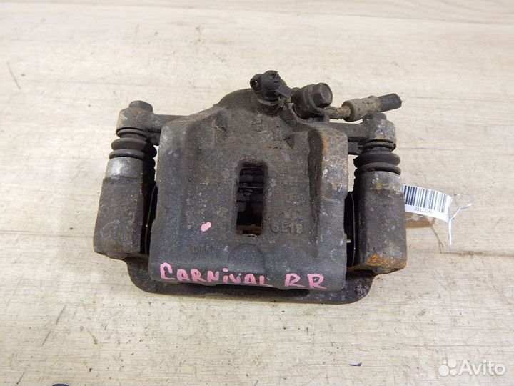 Суппорт задний правый Kia Carnival VQ