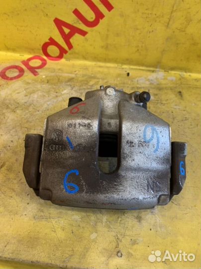 Суппорт тормозной передний левый Volkswagen Golf 6