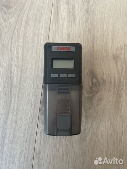 Автоматическая кормушка для рыб eheim