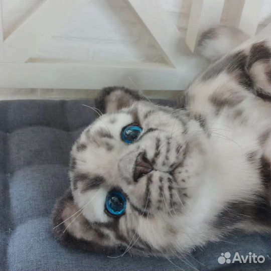 Снежный барс игрушка