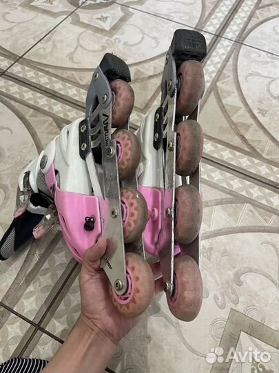 Роликовые коньки