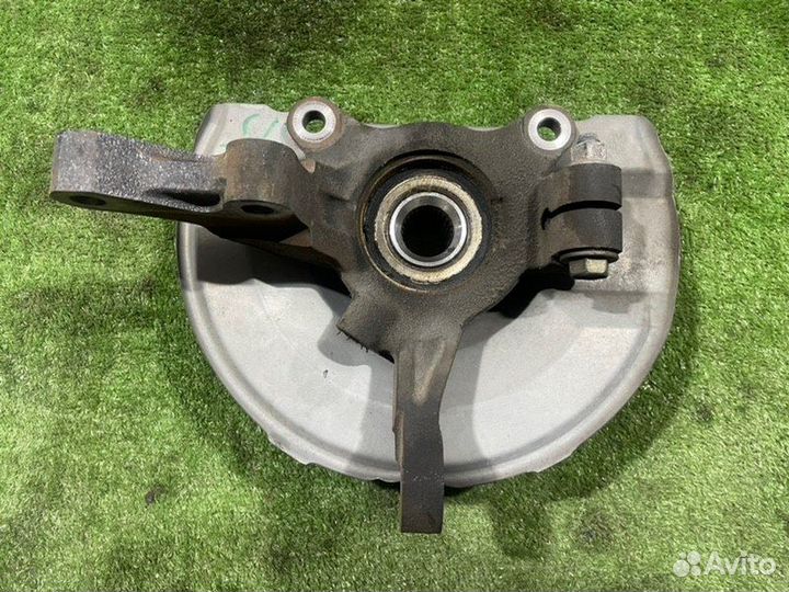 Кулак поворотный передний левый Mitsubishi Lancer