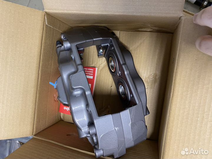 Суппорт тормозной передний левый