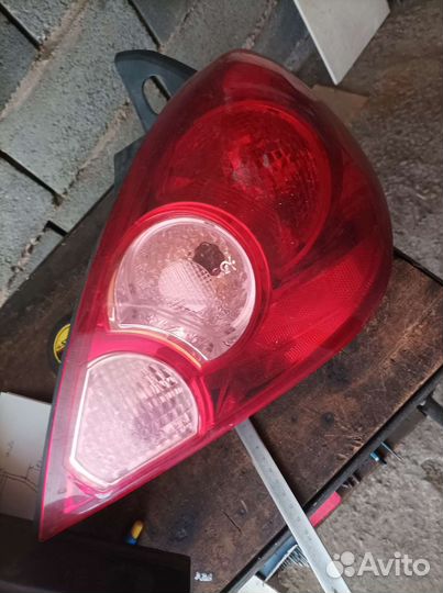 Оптика фары Стоп сигнал Nissan Tiida c11