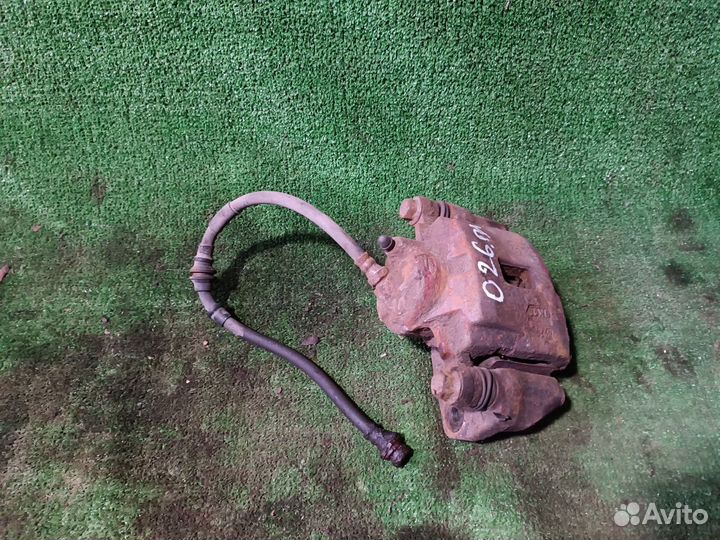 Суппорт тормозной передний Kia Spectra I рестайлин