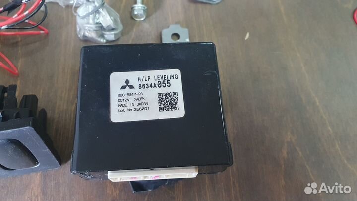 Автокорректор и AFS на Mitsubishi Lancer 10