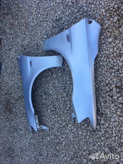 Mitsubishi lancer 10 переднее крыло