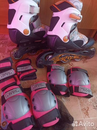 Роликовые коньки