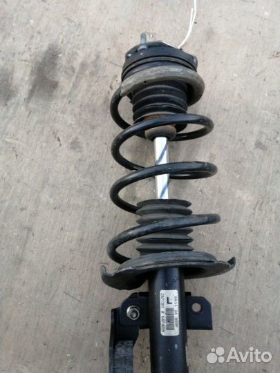 Стойка передняя левая Mazda Demio DE ZJ