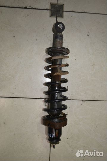 Стойка (амортизатор) задняя Mitsubishi Lancer 9