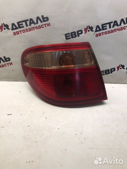 Фонарь левый Nissan Almera N16 седан 1.8 QG18 2001