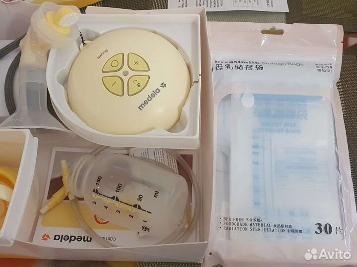 Молокоотсос medela электрический