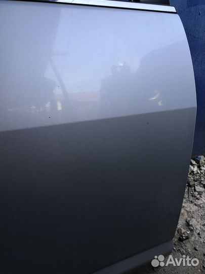 Задняя правая дверь Nissan Tiida 1