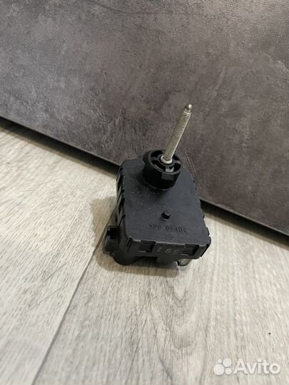 Моторчик корректора фары Toyota