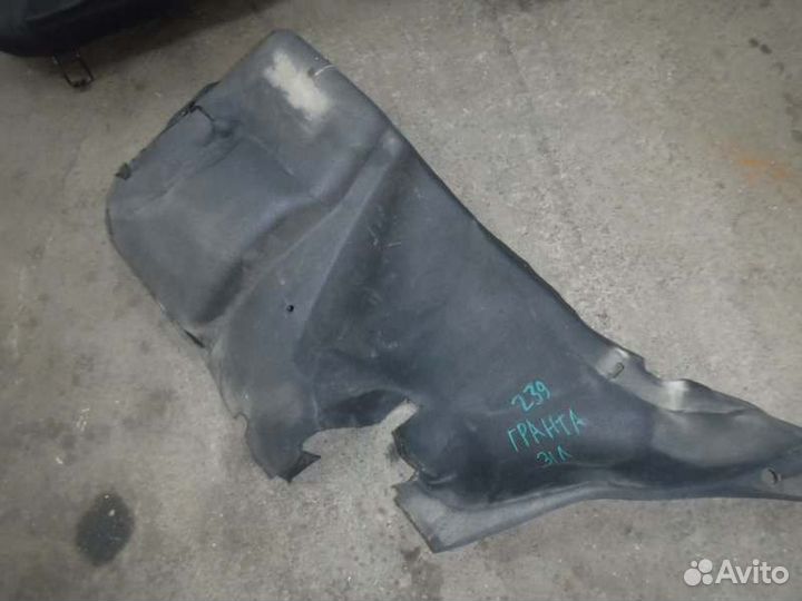 Обшивка багажника задняя левая Лада Гранта 11186