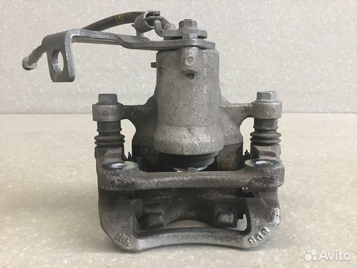 Суппорт задний левый Kia Cerato 2018