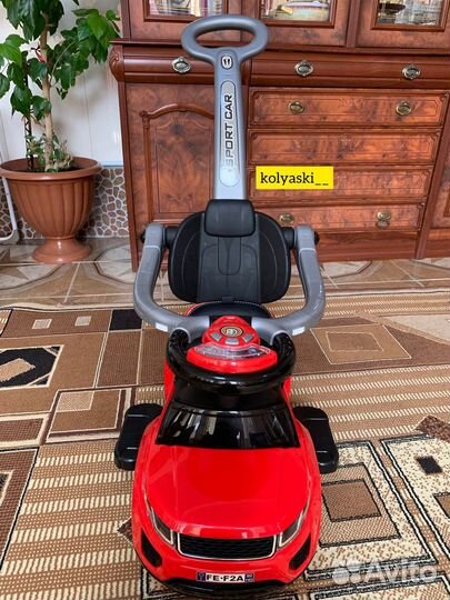 Машинка каталка с ручкой