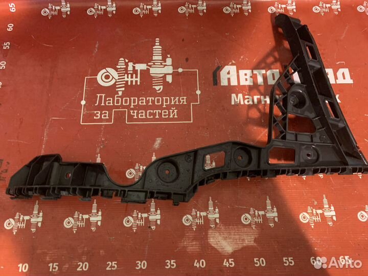 Volkswagen Polo Кронштейн заднего бампера левый