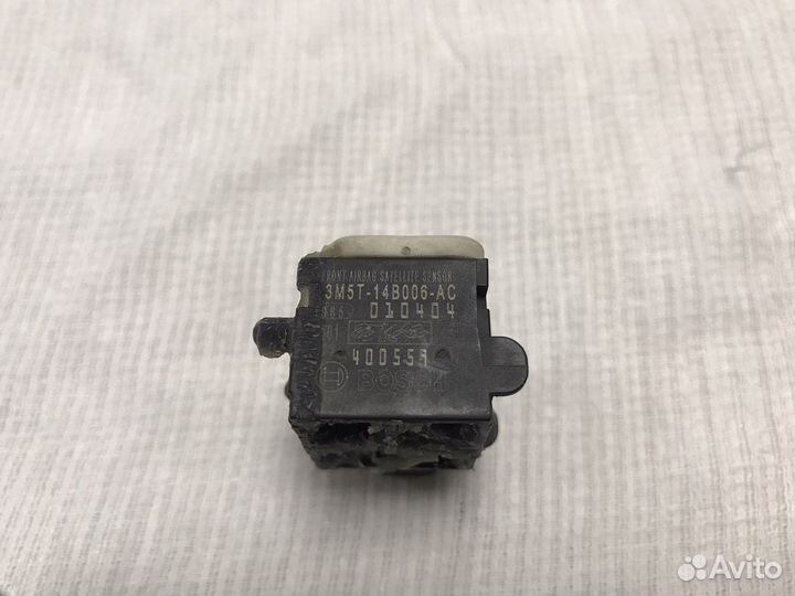 Датчик удара передний Mazda 3 BK седан