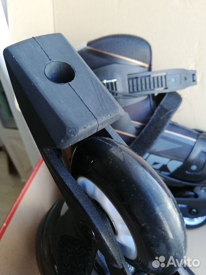 Роликовые коньки