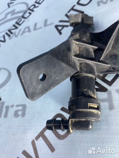 Форсунка омывателя фары Kia Quoris