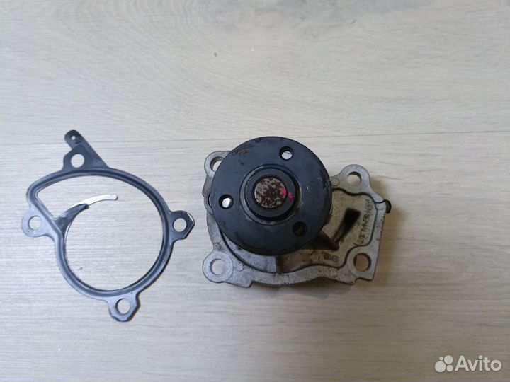 Водяная помпа Рено Логан 2