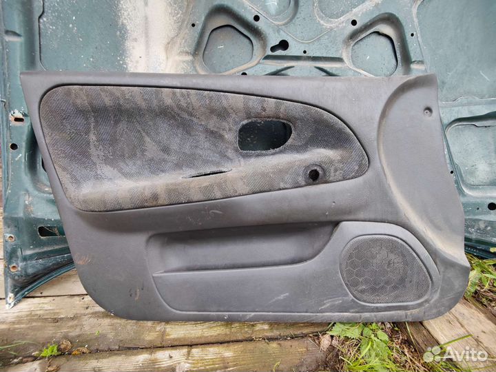 Дверная карта передняя левая Mitshubishi Lancer 7