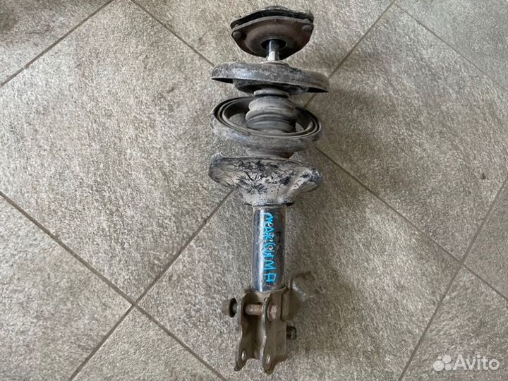 Амортизатор передний Nissan Maxima