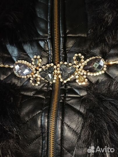 Жилетка меховая женская