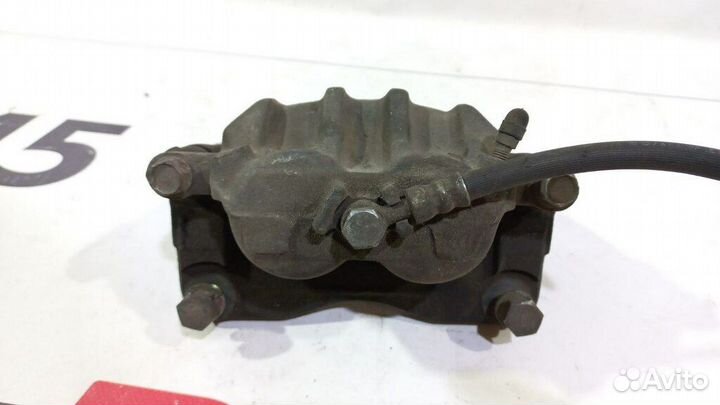 Суппорт передний левый б/у для Subaru Legacy (2629