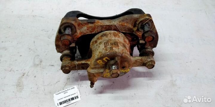 Суппорт передний правый Toyota Corolla E15