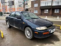 Mazda Familia 1.8 AT, 1994, 260 000 км, с проб�егом, цена 107 000 руб.