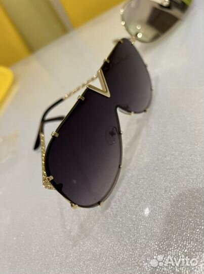 Солнечные очки женские