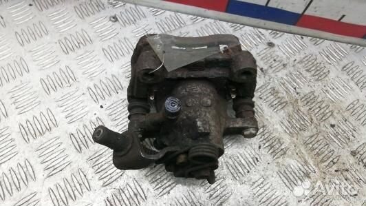 Суппорт тормозной задний левый KIA venga 1 (1SK45L