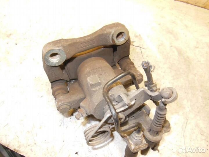 Суппорт задний правый Volkswagen Caddy