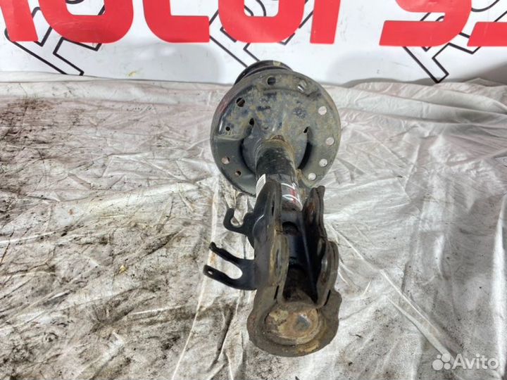 Амортизатор передний левый Opel Corsa D Рестайл