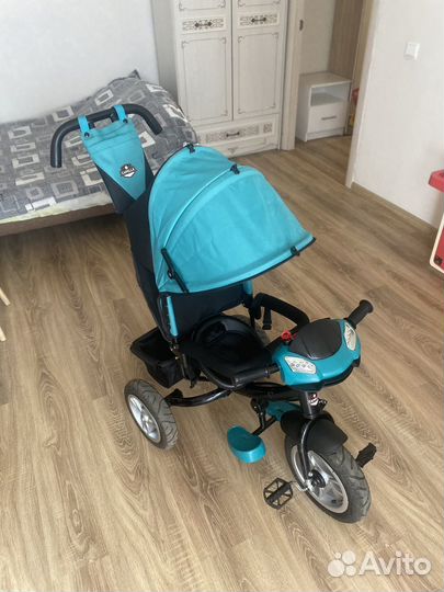 Трехколесный велосипед с родительской ручкой