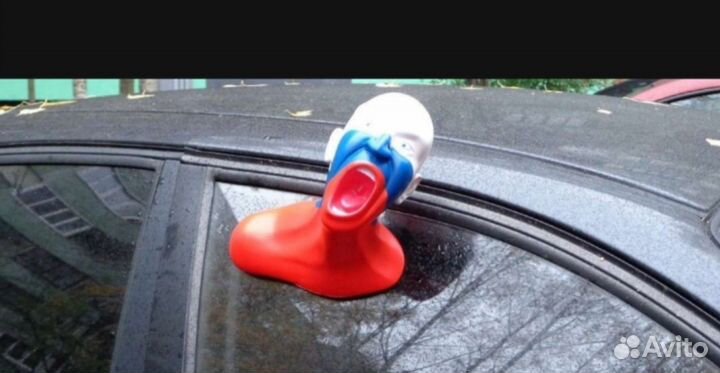 Аксессуар для машин - голова болельщика