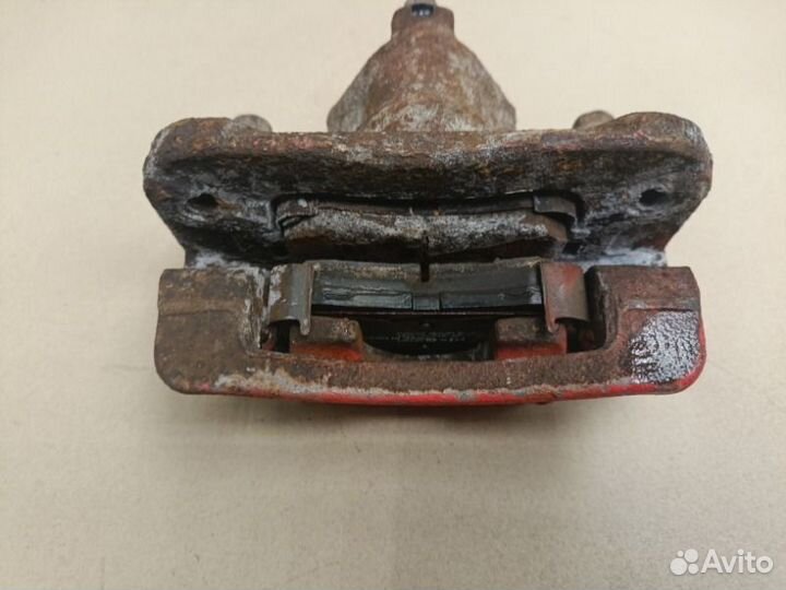 Суппорт тормозной задний левый Kia Cerato TD G4FC