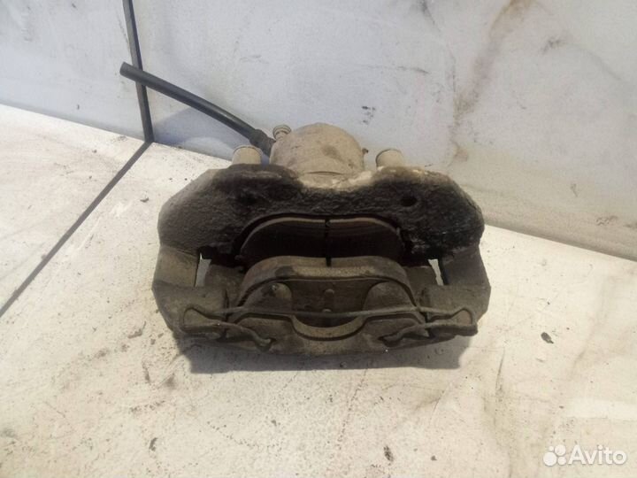 Суппорт тормозной передний левый Ford Focus 2 CB4