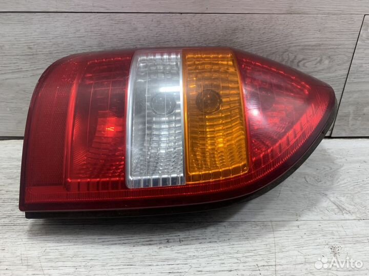 Фонарь задний левый Опель
