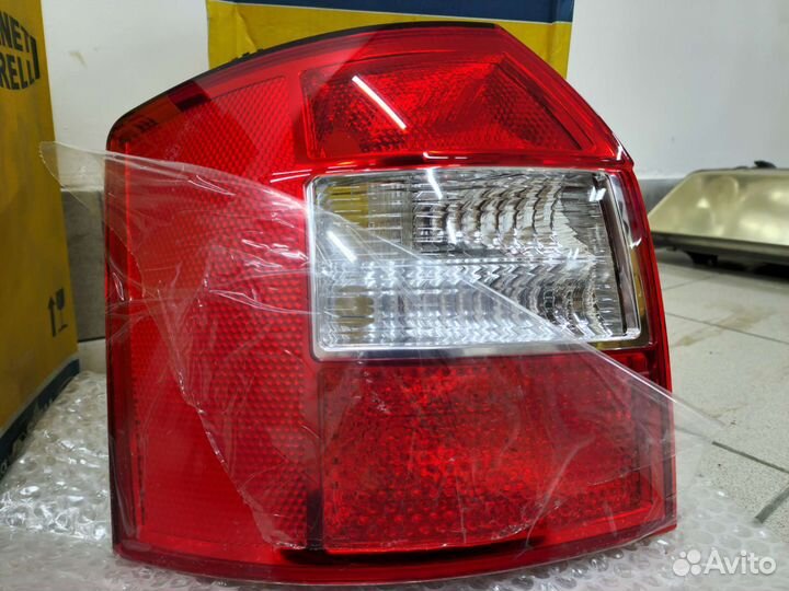 Задний левый фонарь новый Vag Audi A4 B6 Avant