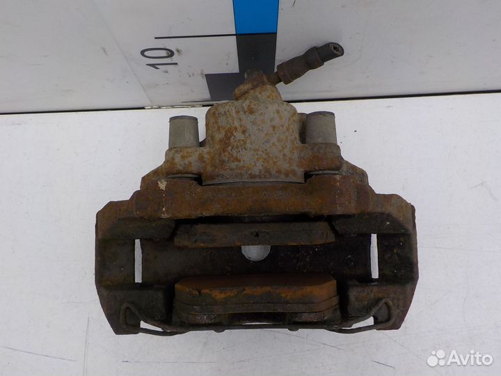 Суппорт тормозной передний левый Volkswagen Polo