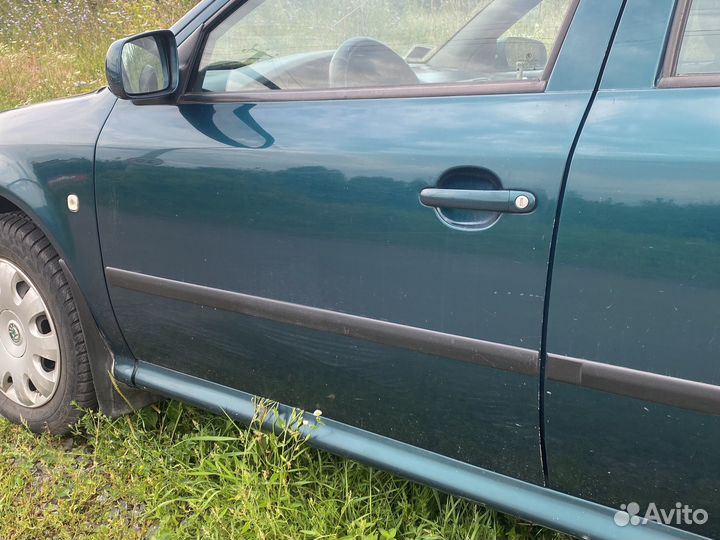 Дверь skoda octavia a4