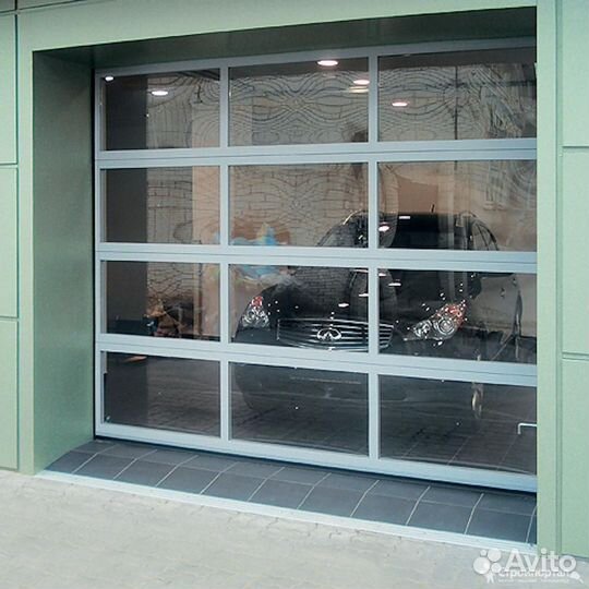 Автоматичeские секциoнные ворота Алютex