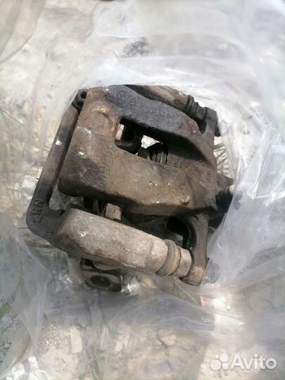 Суппорт задний левый kia Рио 3