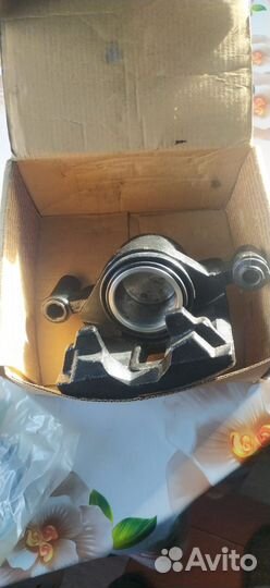 Суппорт передний левый