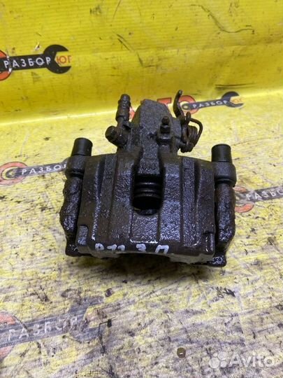 Суппорт задний правый Nissan Primera P12 QG18DE